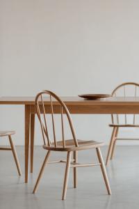 A modern take on traditional New England furniture, the Hudson dining chair and Shaker Heirloom Dining Table