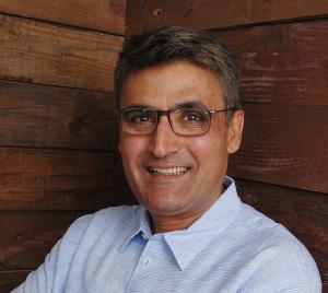 Color photo of Naaz Scheik, CEO and Founder of SoftPak FInancial Systems
