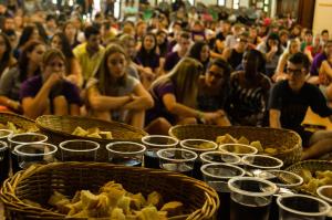 Young evangelicals partake of communion at a youth event.