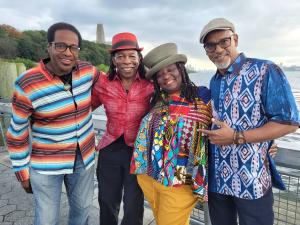 Vienna Carroll and band members, Keith Johnston, Stanley Banks, Washboard XT (Newman Taylor Baker)