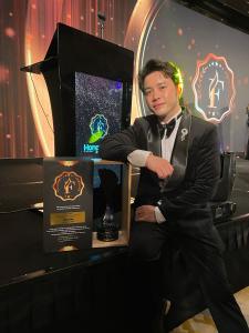 Dr Kevin Lau Accepting Fluxx Award
