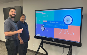GO Technology Group team demonstrating Promethean ActivPanel 10 to educators during hands-on training workshop in Chicago