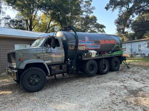 The branded truck for Anytime Plumber that they use for septic pumping services.