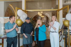 Mayor Holli Thier Presenting the Proclamation to Owner, Betul Kinalilar.  Also featuring: Betul's husband, Berk Kinalilar and Executive Chef Membreno
