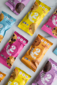 Assortment of 2Betties Bites flavors including Maple Cinnamon, Chocolate Chunk, Sweet Almond, Lemon and Chocolate Chip.