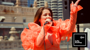 Fany de la Chica performing on a rooftop in Indie Rooftop’s flagship streaming series.