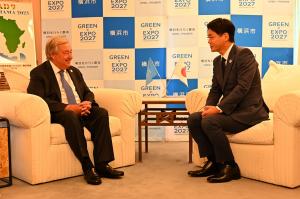 Yokohama Mayor Yamanaka sitting and speaking with UN Secretary General Guterres at TICAD9