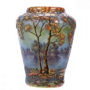 This French cameo art glass vase signed Daum Nancy, 10 inches tall, with a superb enamel fall season scenic décor, one of the best Daum Nancy vases out there, should go for $7,500-$12,500.