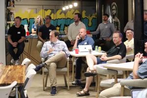 a group of software developers watching a presentation