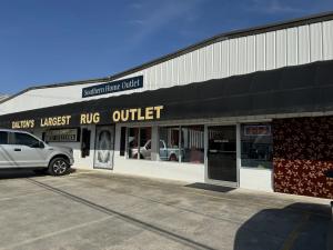 Southern Home Outlet storefront showcasing the area's largest rug and antique outlet.