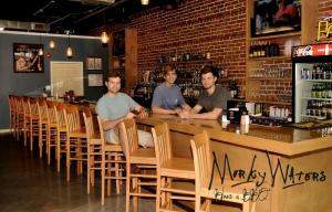Murky Waters Owners in 2013 after closing their small business loan with RCLF for their first restaurant