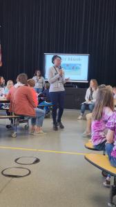 Author Courtney Kelly explains the use of barrier islands and teaches students how to build their own in Stuttgart, Germany