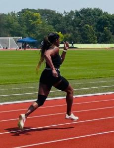 Woman running track & field