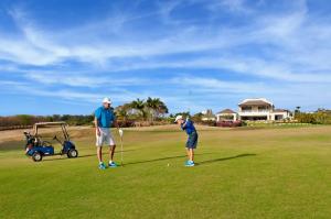 Golfers Enjoying a game at Royal Westmoreland, Barbados