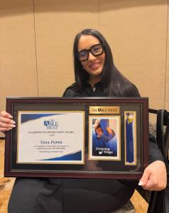 Photo shows Tina Pepin, Executive Director of the Pepin Family Foundation and The Able Trust Champion of Opportunity Award
