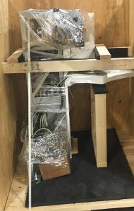Custom crates protecting microscopes, spectrometers, and robotics for university lab shipments.
