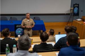U.S. Navy Rear Adm. Anthony Carullo, Director of Warfare Development (OPNAV N72), delivers keynote remarks during the Naval Postgraduate School’s Warfare Innovation Continuum workshop on Non-Permissive Global Sea Control.