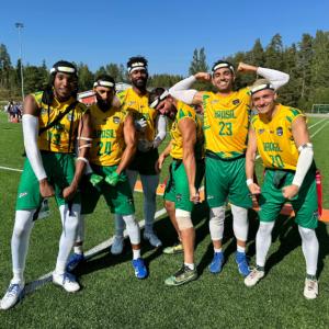 Team Brasil Flag Football player competing in SYZMIK Sports X7C headgear during international competition.