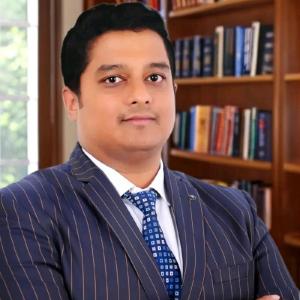 Portrait of Pinaki Ranjan Aich, cybersecurity and GRC leader, author of Exploring AI Role In Enhancing Cybersecurity