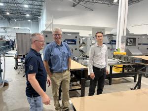 Photo of Technology inventors from Blue Frontier and NREL visiting manufacturing plant