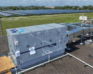 Photo of Blue Frontier's ultra-efficient AC unit storing solar energy and providing cooling for an office building in Riviera Beach, FL