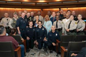 Picture featuring City of Carson Hero Awardees with First Responders and Carson City Council