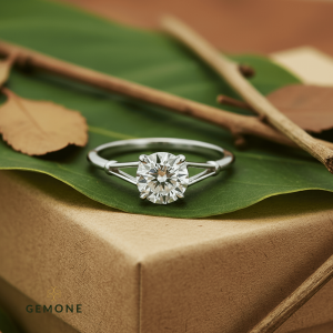 Round-cut lab-created diamond solitaire engagement ring displayed on eco-friendly packaging