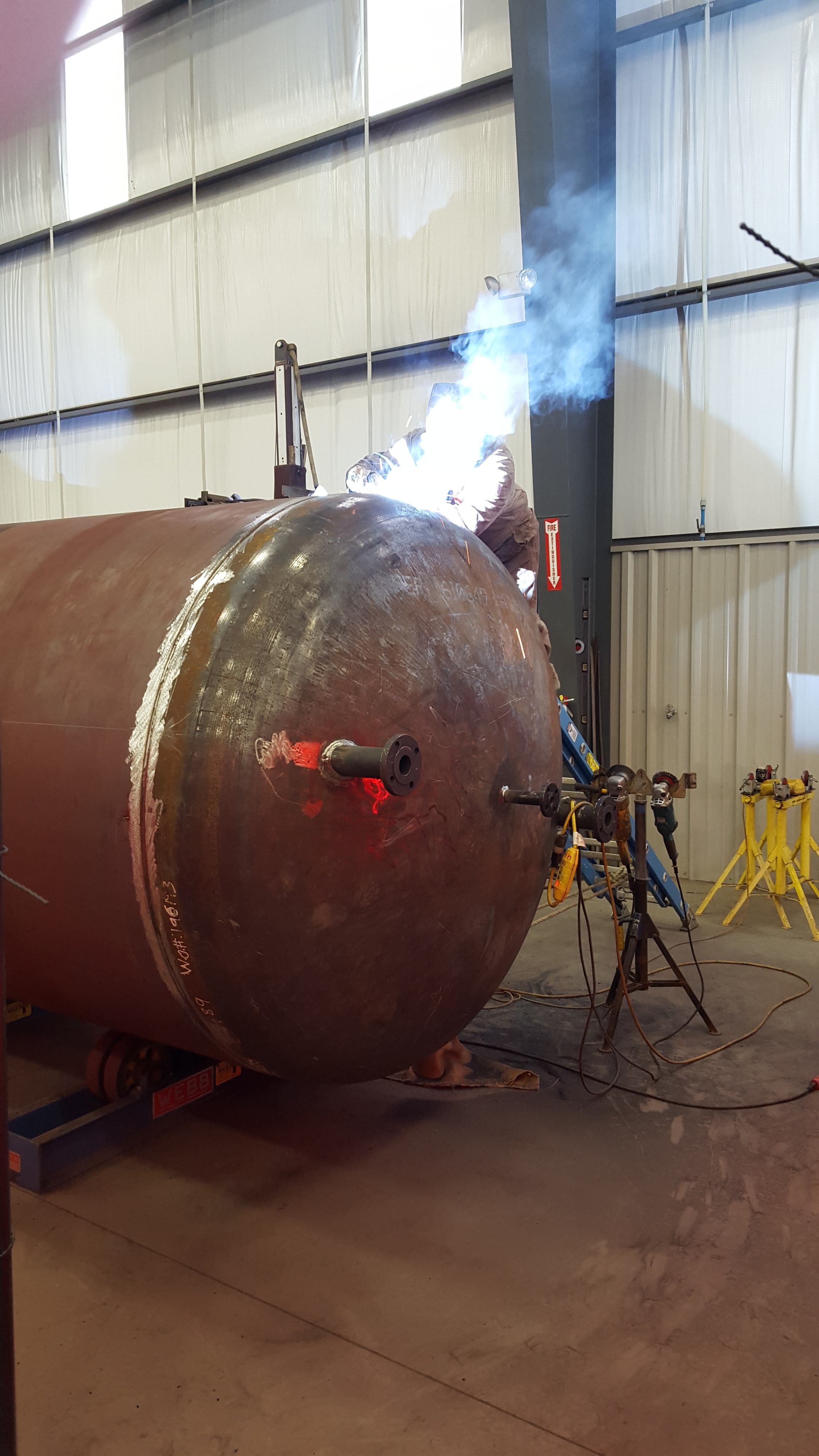 Raw Welding Inc. welder performing fabrication work on a metal structure in Bakersfield, California