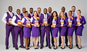 A group of Flight Ready Academy Graduates holding their Flight Ready Academy Certificates