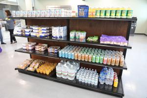 A grocery shelf in the Jaguar Market at San Jose City College where students are provided fresh dairy, poultry, produce, and dry goods at no cost.