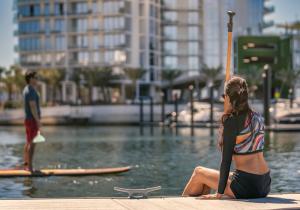 Tampa Bay Living paddleboarding on the bay