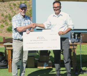 Ojai Valley Youth Foundation, James Flemming accepting donation
