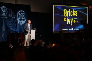 Tom Ricketts addresses crowd at Bricks & Ivy