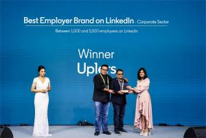 Uplers receiving award by Linkedin