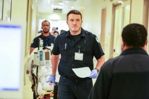 Emergency medical team at King Faisal Specialist Hospital and Research Centre transporting a patient
