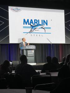 Drew Greenblatt - President of Marlin Steel on stage at FabTech Recieves 2025 Reshoring Metalworking Award