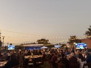 Harvest of Hope Gala at Maryvale features supporters across Los Angeles County enjoying an outdoor dinner under lights.
