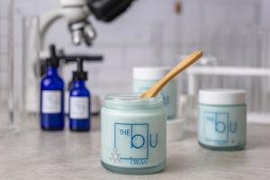 BLU Drops, BLU Cream with science lab in the background