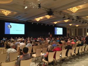 Brad Deflin speaking at Total Wealth Symposium in Las Vegas 2018