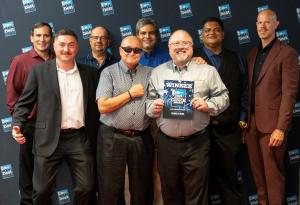 Slug-A-Bug team members, including President Steve Lum, celebrating winning Best Pest Control Company award in Brevard County.