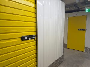 INSOMNIAC SmartLock® unit locks on yellow doors at U Store It self storage facility in Dublin