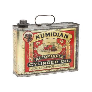 Circa 1920s Canadian two-sided lithographed tin for C.C. Snowdon Numidian Automobile Cylinder Oil, with a graphic of a race car from the 1911 Indy 500 (CA$20,060).