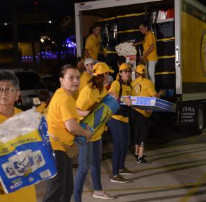 In Florida, Volunteer Ministers loaded a 16-foot truck with food and supplies and shipped it to the Bahamas by boat