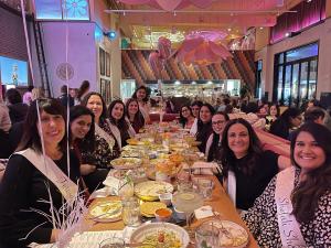 Women in GI attend the Galentine's Day Meetup