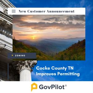 An image of the Smoky Mountains against the background of a government building with overlay text indicating this is a GovPilot new customer announcement about the local government launching online building and zoning permits