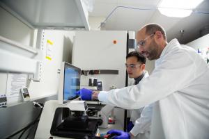 Two scientists working in the lab at the allen institute