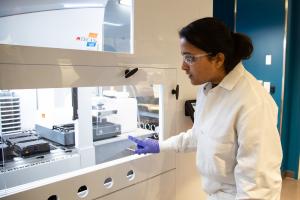 A scientist observes immunological data collection at Allen Institute