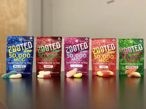 An array of the ZOOTED | THCP / Delta 9 Gummies in 5 Flavors on the table.