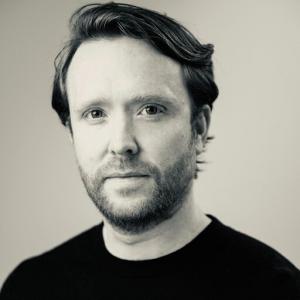 A black and white image of Donal, staring determinedly into the future.
