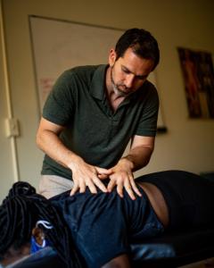 Oakland car accident chiropractor Dr. Ben Glass at Oakland Accident Care clinic specializing in personal injury recovery and settlement documentation